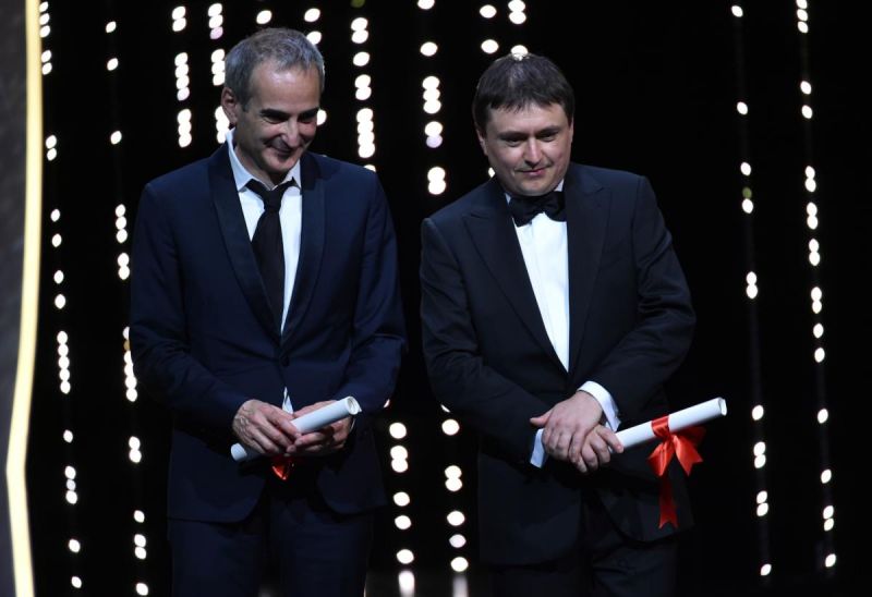 Cristian Mungiu e Olivier Assayas, prémio de realização ex-aequo [Alberto Pizzoli / AFP]